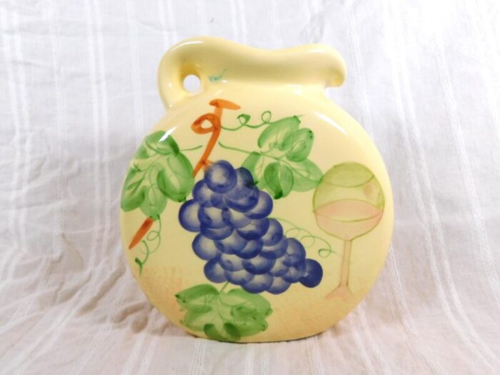 1950s yellow pitcher with grape design 8894