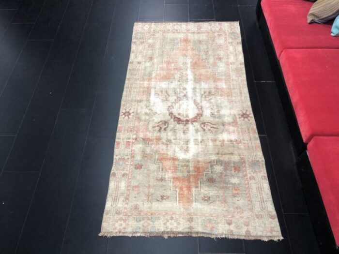 antique orange faded distressed rug 1