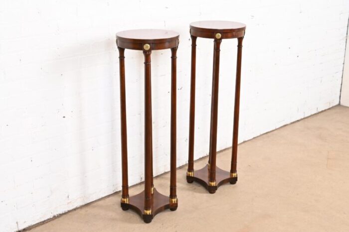 baker furniture regency mahogany and brass pedestal plant stands pair 0539