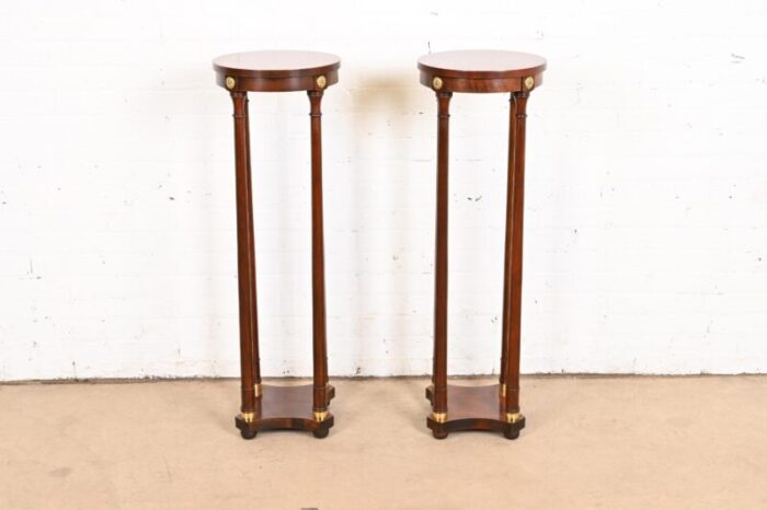 baker furniture regency mahogany and brass pedestal plant stands pair 2587