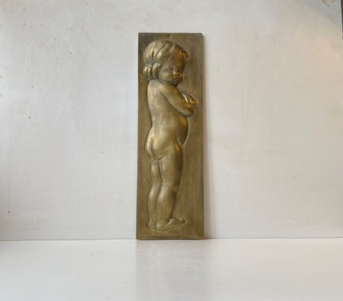 bronze relief wall plaque of infant girl 1930s 1