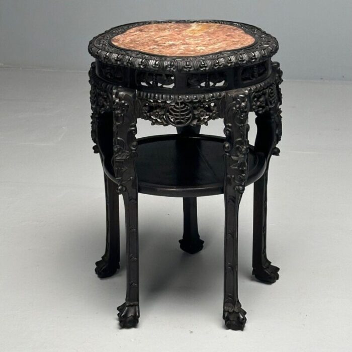 chinese heavily carved occasional tables or pedestals teak marble 1920s 0170