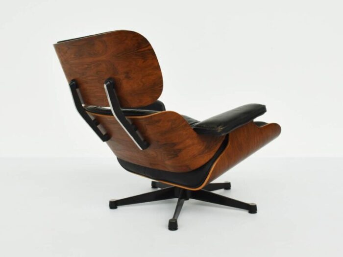 eames lounge chair in rosewood and patinate black leather by herman miller 1956 9908