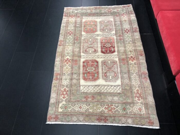 hand knotted faded wool rug 3