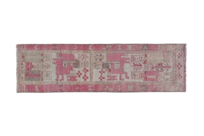 kurdish distressed pictorial runner rug with human motif 2