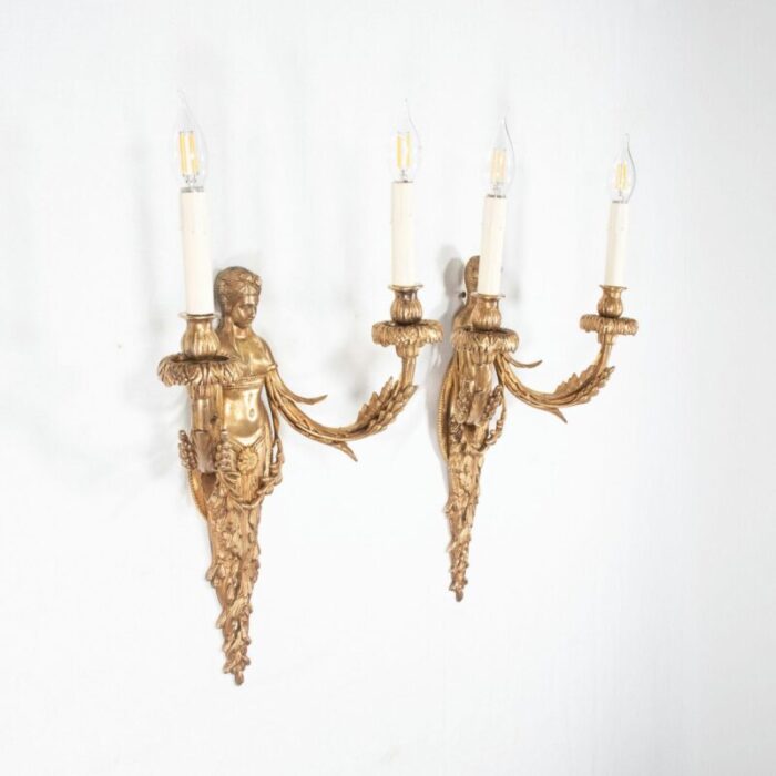 large pair of 19th century french empire style gilt bronze sconces featuring caryatids of acantha 4953