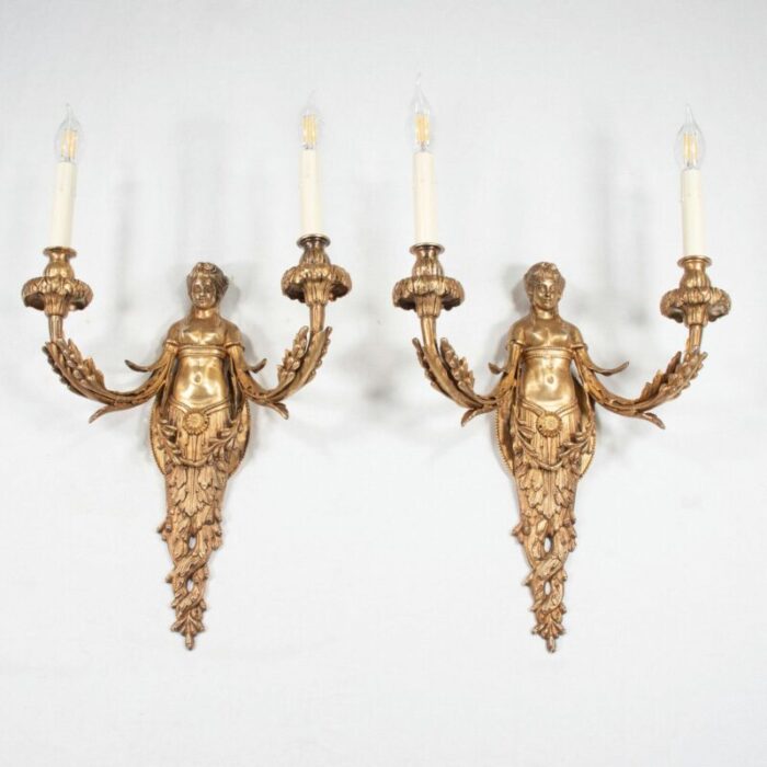 large pair of 19th century french empire style gilt bronze sconces featuring caryatids of acantha 5059