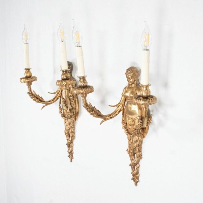 large pair of 19th century french empire style gilt bronze sconces featuring caryatids of acantha 7326