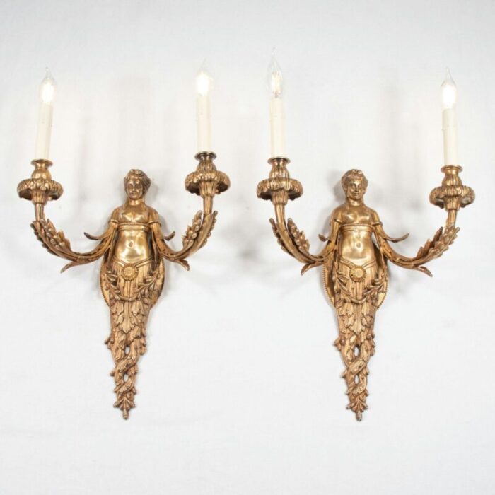 large pair of 19th century french empire style gilt bronze sconces featuring caryatids of acantha 8148