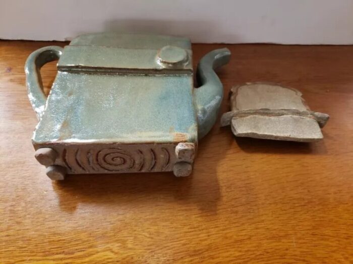 late 20th century heavy green glazed art pottery teapot shaped toaster with slice of toast lid 8465