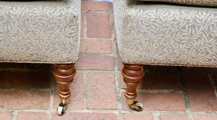 late 20th century vintage slipper chairs on brass casters a pair 6896