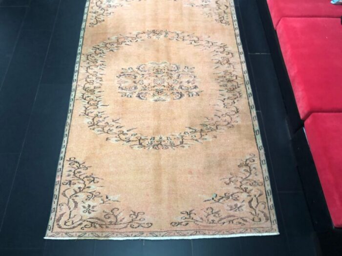 orange faded oushak rug 2