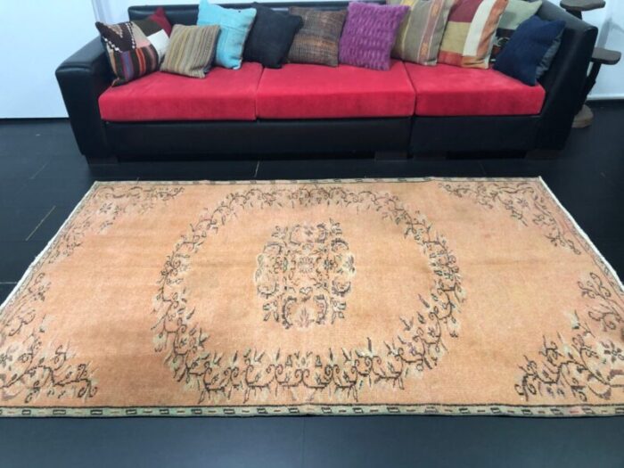 orange faded oushak rug 3