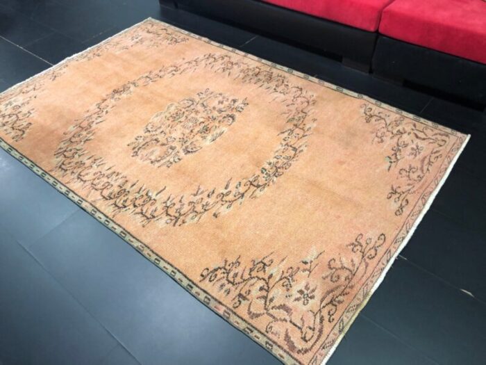 orange faded oushak rug 4