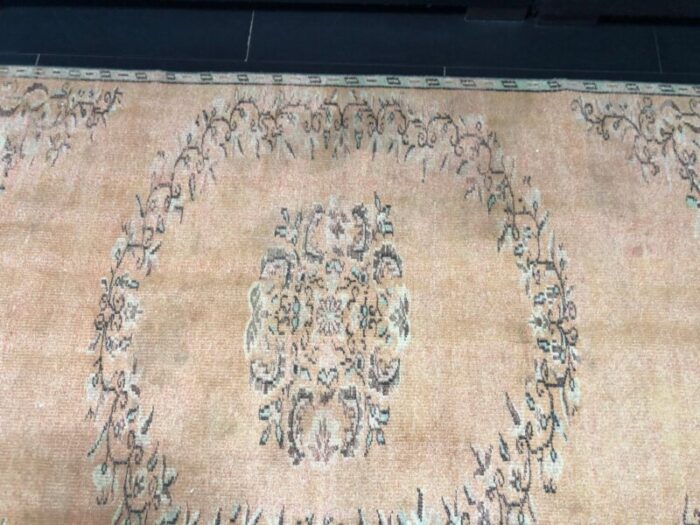 orange faded oushak rug 7