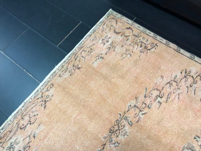 orange faded oushak rug 8