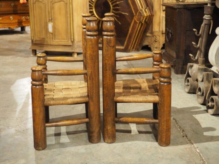 pair of circa 1940 charles dudouyt style french low chairs in carved beech 4145