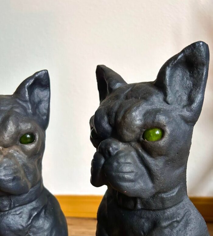 pair of early 20th century cast iron french bulldog andirons with green glass eyes 3509