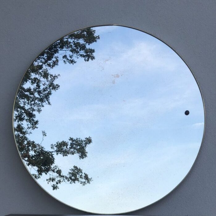 round mirror in brass 1