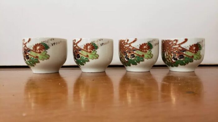 set of 4 1970s japanese kozan gama sake cups with floral motif 0954