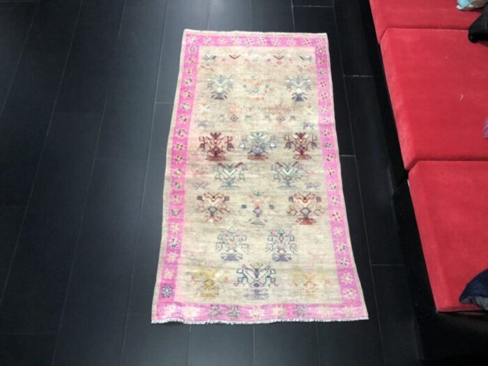 small beige and pink hand knotted wool area rug 1