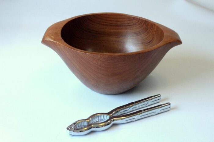 teak serving bowl with a metal nutcracker set of 2 vintage 9624