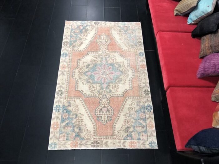 turkish faded orange medalion rug 1