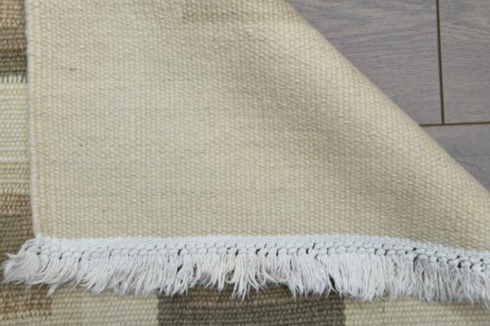 turkish minimalist kilim rug in cream brown wool 7