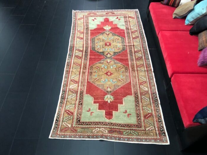 vintage anatolian red and green ousha rug 1