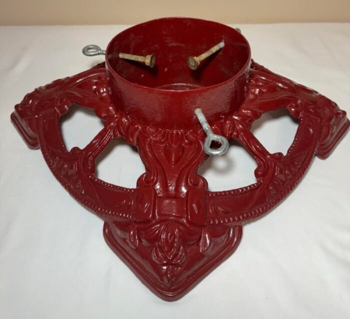 vintage red enameled embossed cast iron christmas tree stand large diameter 8042