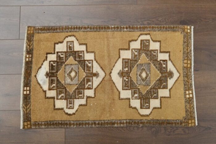 vintage turkish brown white faded orange rug 1