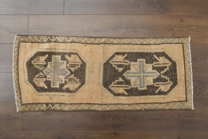 vintage turkish faded orange rug 1 1