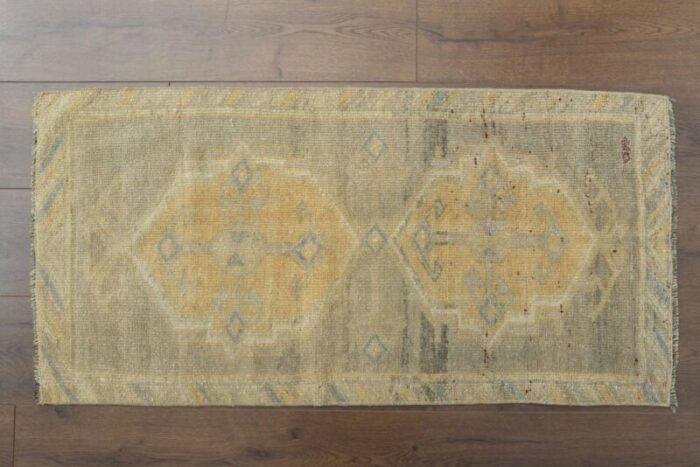 vintage turkish faded orange wool rug 1