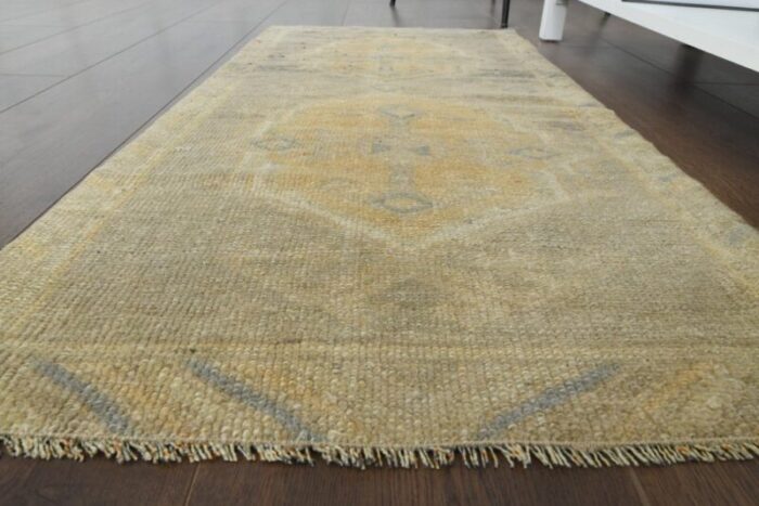 vintage turkish faded orange wool rug 7