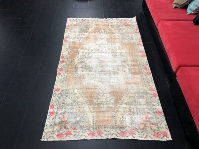 vintage turkish faded oushak area rug 1