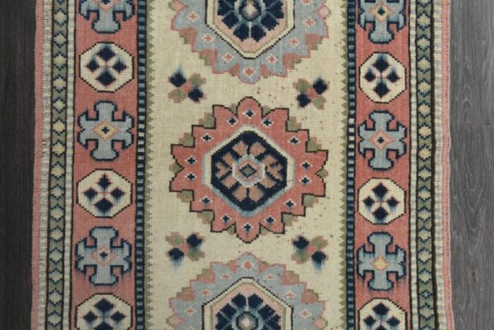 vintage turkish faded red and cream wool oushak rug anatolia 1960s 4