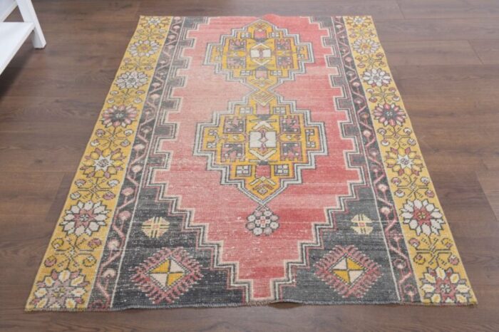 vintage turkish pink and yellow rug 2