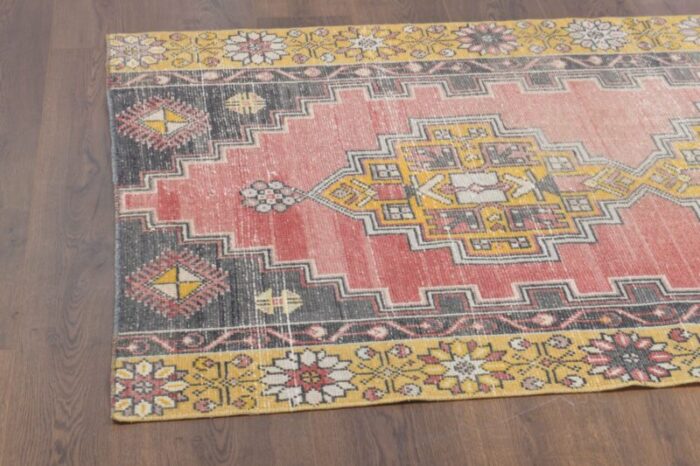 vintage turkish pink and yellow rug 5