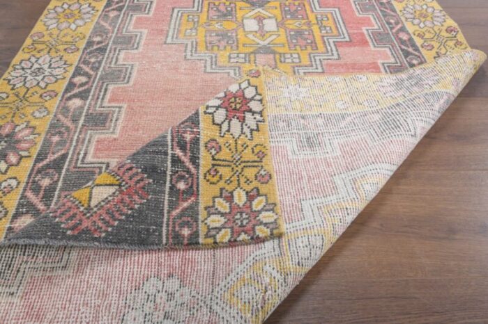 vintage turkish pink and yellow rug 6