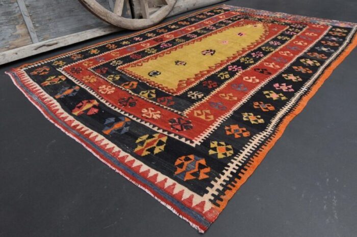 vintage turkish red and yellow area rug 2