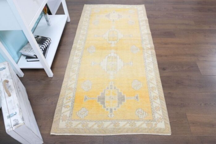 vintage turkish yellow runner rug 2