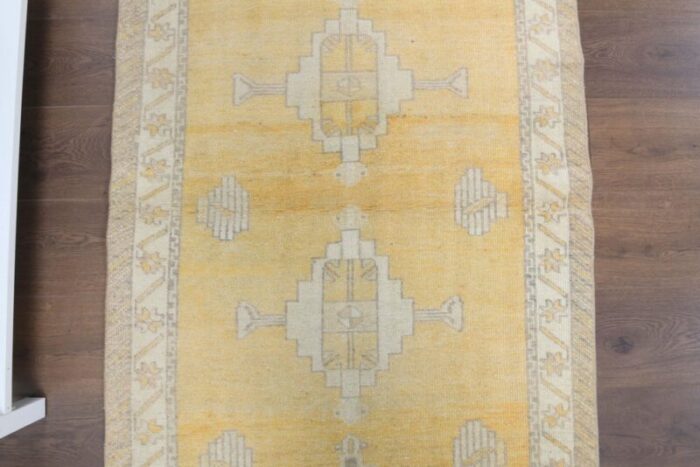 vintage turkish yellow runner rug 6