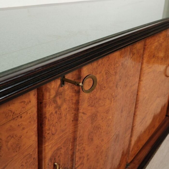 vintage wooden sideboard with decorated glass top and bar compartment 4640